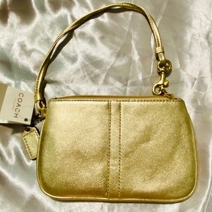 COACH Leather Small Wristlet in Gold